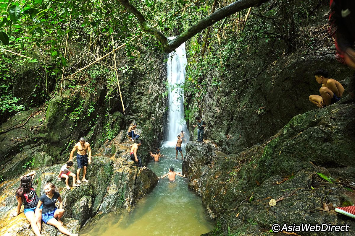 People chilling at the Bang Pae waterfall, Phuket