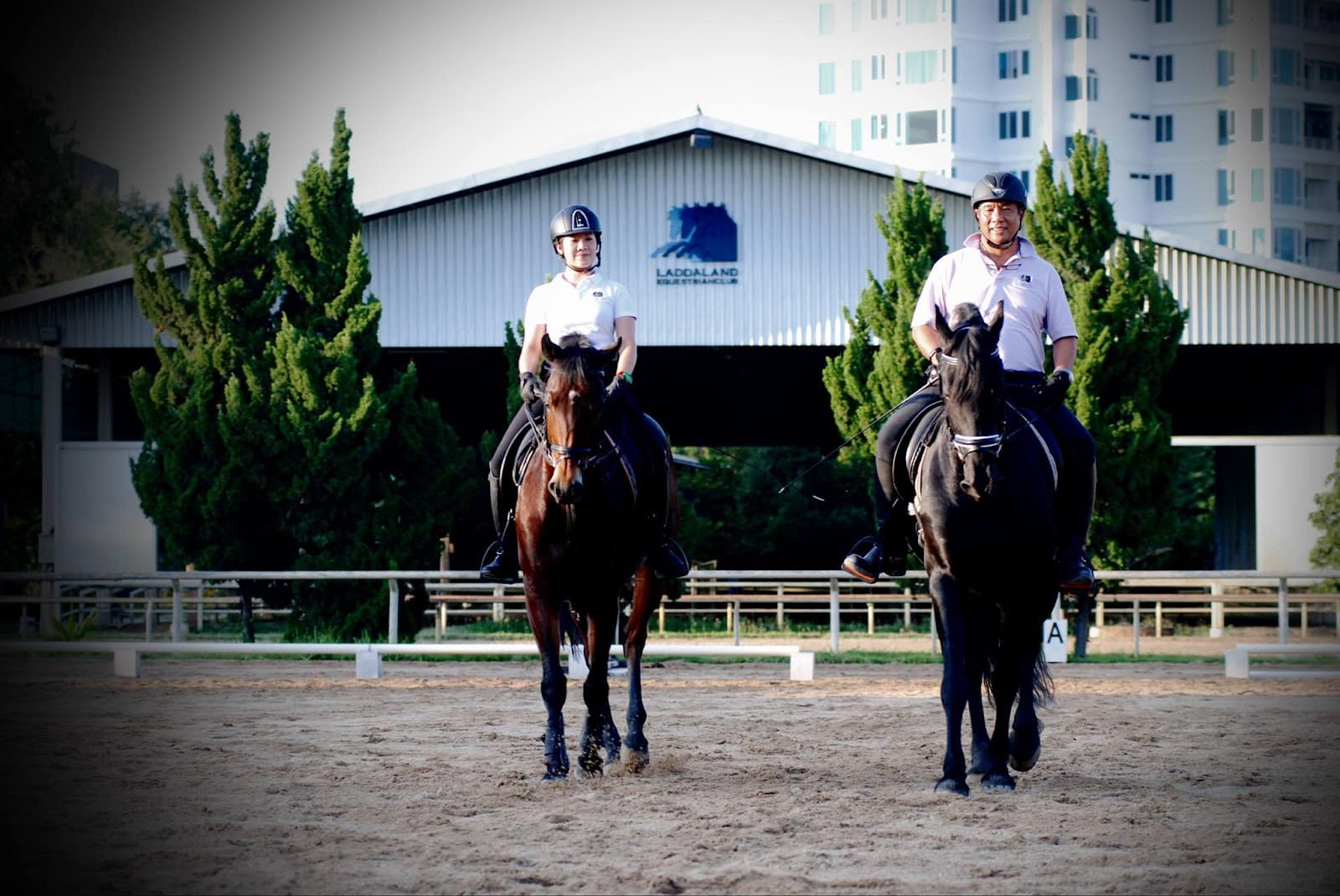 A couple enjoying recreational horse riding at Laddaland Equestrian Club