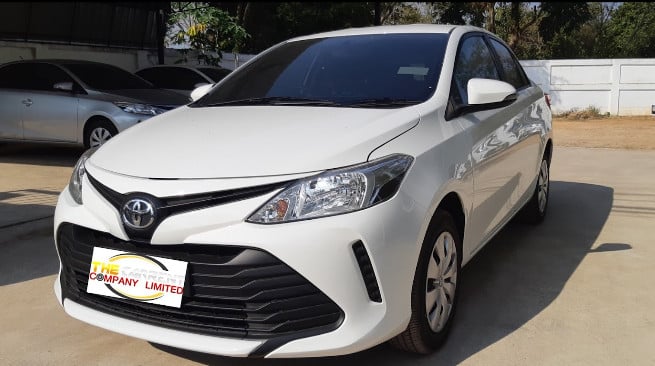 A sedan rented from the Carrent Company, Chiang Mai