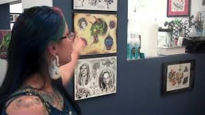 Artist Displaying All Previous Tattoo Work Done by Lady Luck Tattoo