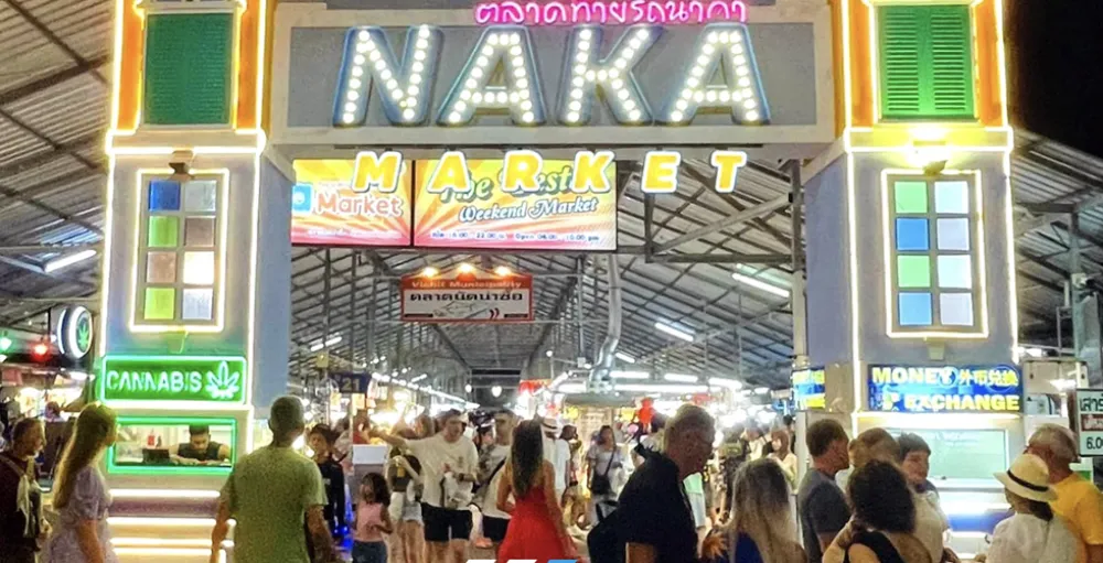The lighted signage at the entrance of Naka Market in Phuket