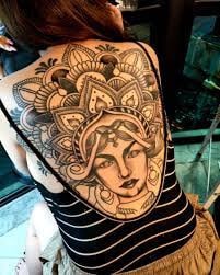 A Woman Getting Tattoed at Perfect Skin Tattoo