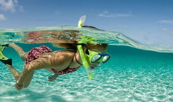A woman enjoying diving on Lanta Klong Nin Beach