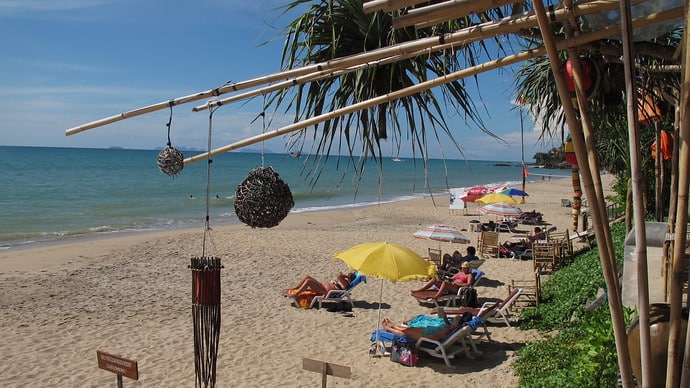 People enjoying sunbathing on Klong Khong Beach