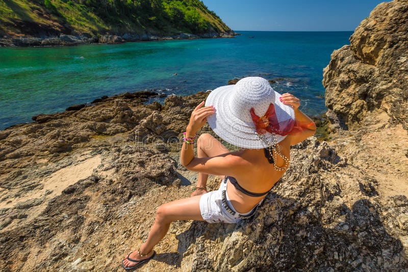 A tourist sunbathing on Nui Beach