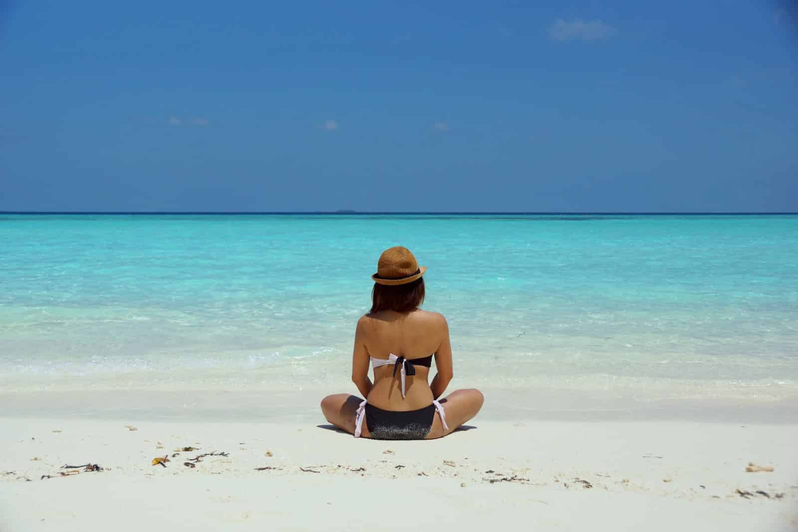 A woman enjoying sunbathing on Klong Toab Beach