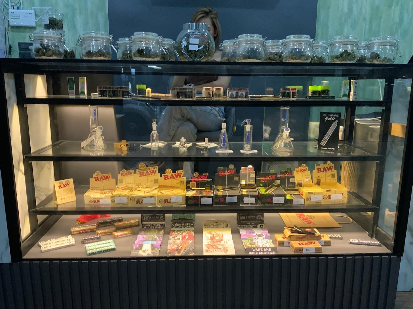 Glass Shelf Displaying Cannabis Products at Ganja Land Ganja Land, Surat Thani