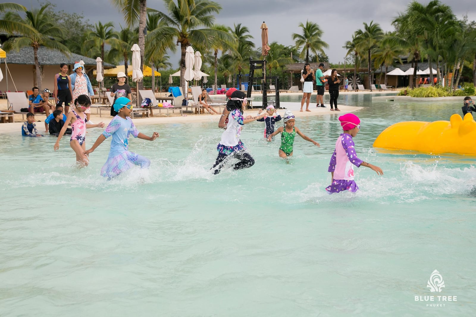 Children enjoying at the Blue Tree Water Park, Phuket Food served in Mangosteen Resort